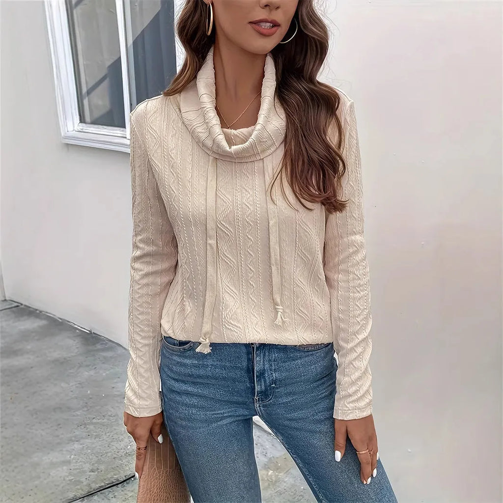 Apricot coloured long sleeve hooded pullover sweater with a drawstring