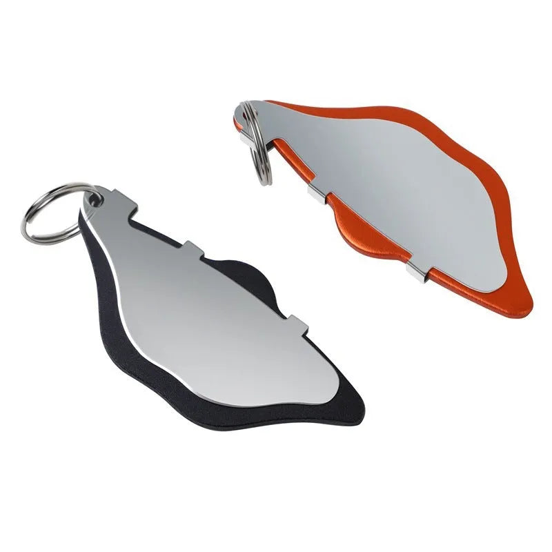 Mountain bike disc brake replacement linings in black and orange colours with adjustment flap