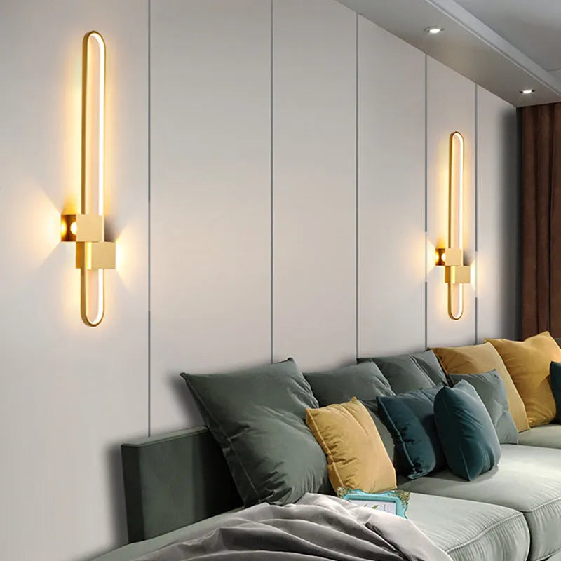 Round 60cm modern wall lamp with iron shade in black or gold frame finish.