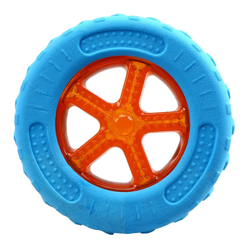 Set of three TPR dog toys: a floating ball, barbell and tyres with bumpy textures for squeaky fetch play.