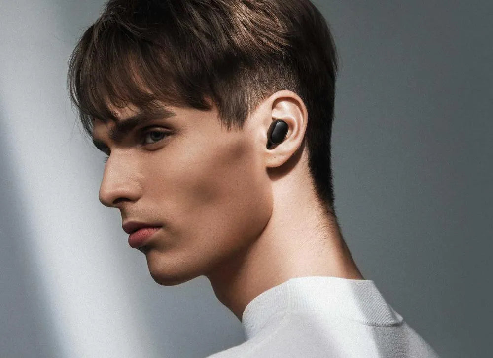 Redmi AirDots 2 black true wireless earbuds with charging case on a white background