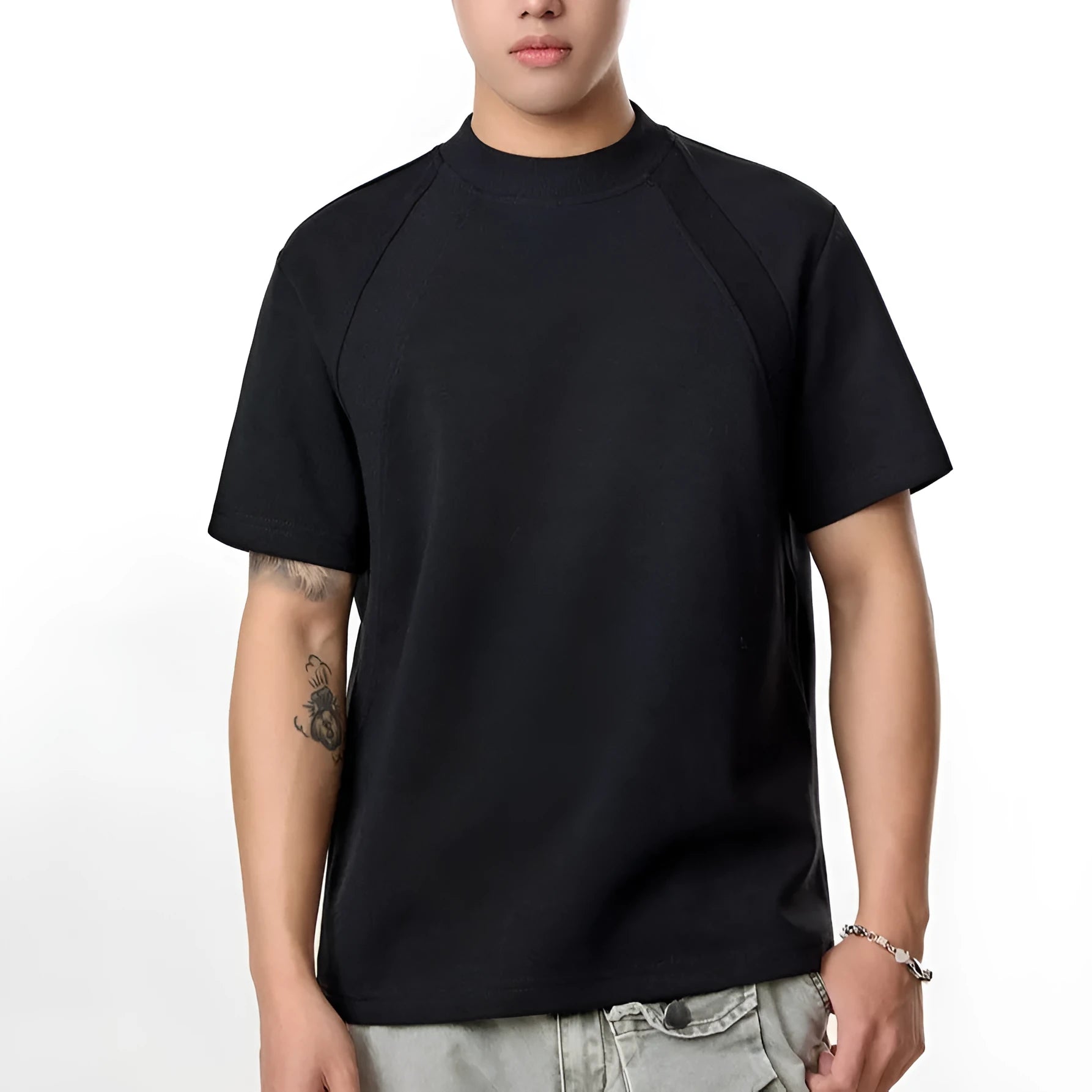 Loose fit black short sleeve casual top made from polyester fabric.