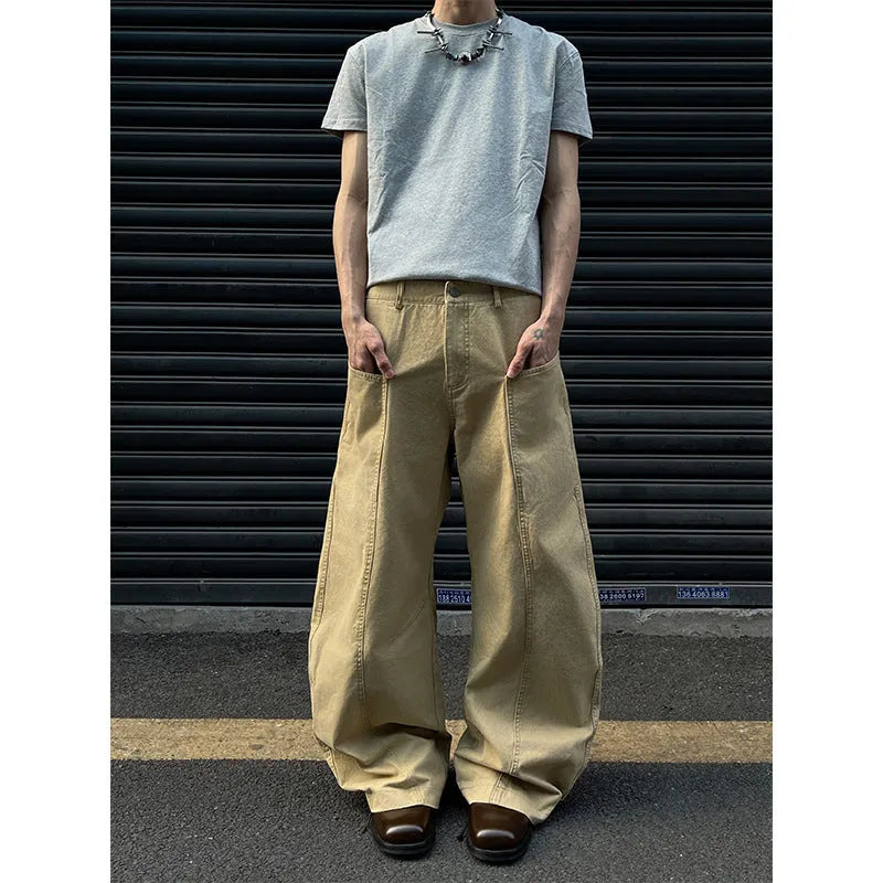 Men's khaki-coloured straight-leg cotton trousers laid flat, showing American retro casual style.