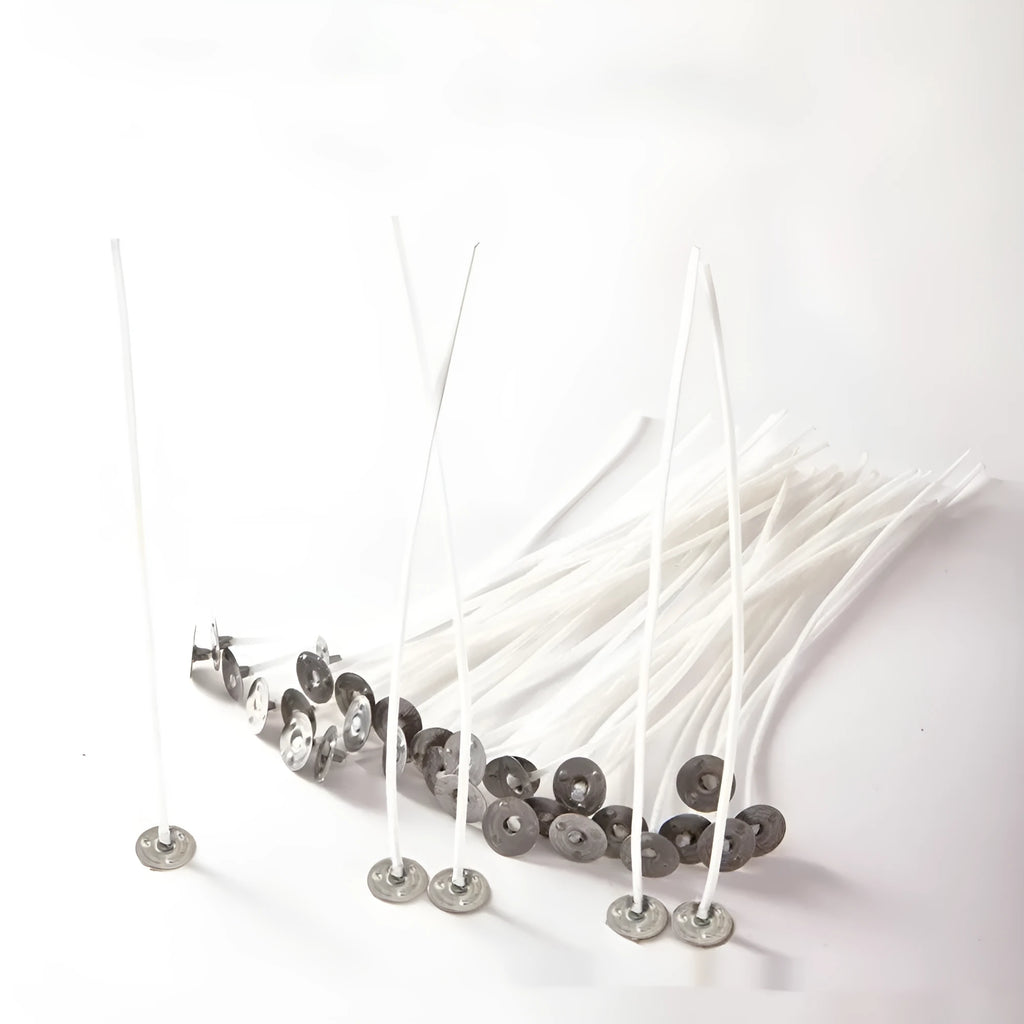 White cotton candle wicks showing three different lengths: 2.6cm, 6cm and 8cm for DIY candle making