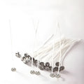 White cotton candle wicks showing three different lengths: 2.6cm, 6cm and 8cm for DIY candle making