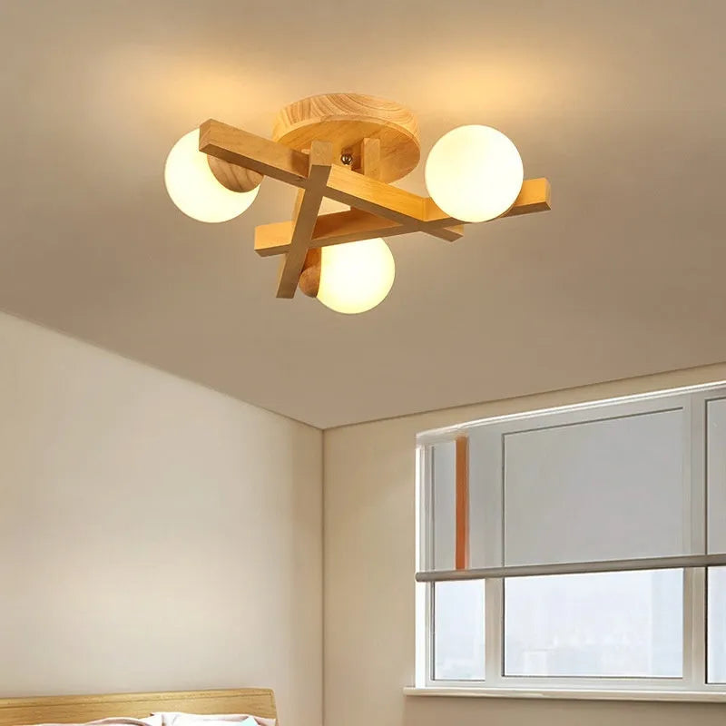 Wooden style circular ceiling lamp with three pendant lights in a Nordic design
