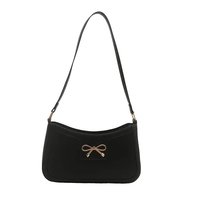 Western style baguette shoulder bag in horizontal square shape with bow decoration, shown in available colours