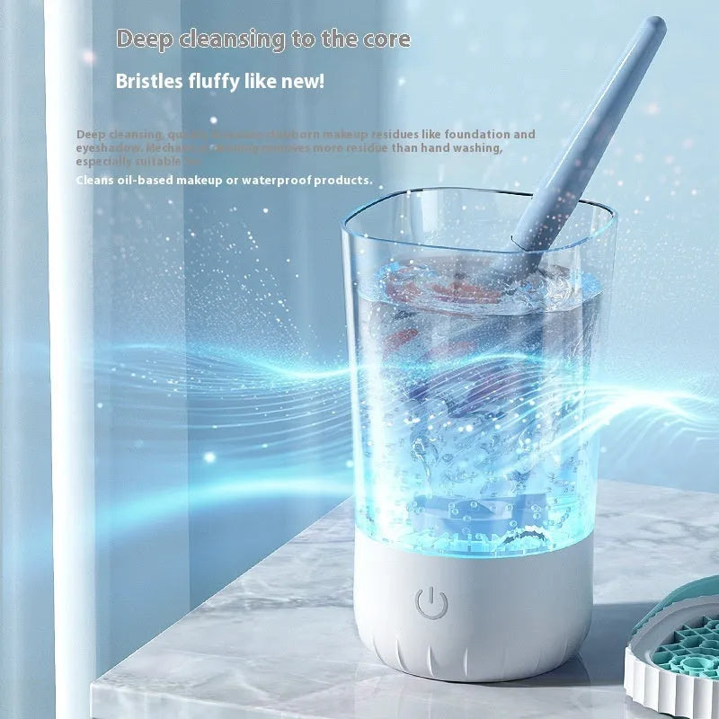 White rechargeable electric makeup brush cleaner with plastic housing and USB cable