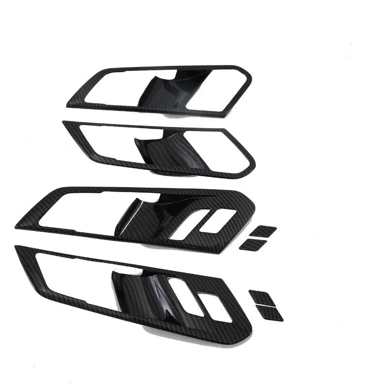 Black ABS replacement trim panel for 2019 BMW X5 front cup holder and air vent.