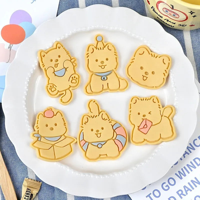 Three-dimensional plastic biscuit mould with puppy cartoon designs for making decorated dog-themed cookies and candies