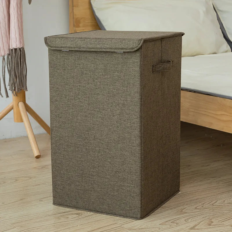 Foldable cotton-linen storage basket in grey colour showing three-dimensional construction