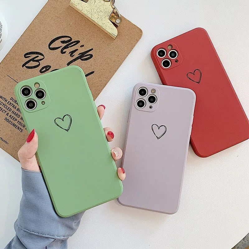 Solid colour TPU silicone back cover case for Apple iPhone on a table.
