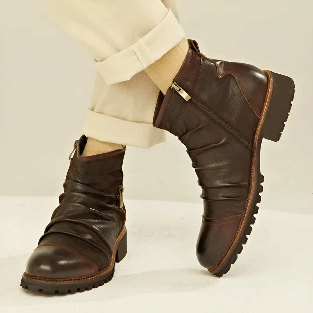 Black embossed PU cowboy boots with a side zipper and mid-height horseshoe heel on a plain background.