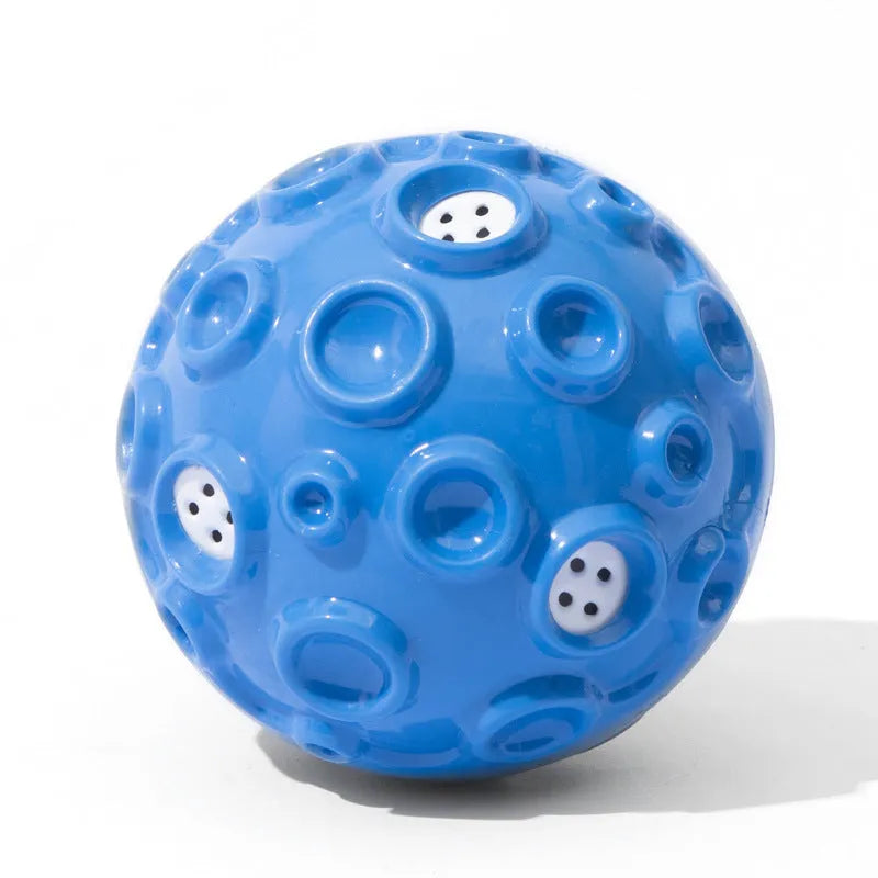 Durable rubber dog ball toy with meteorite-shaped bumps in assorted colours for aggressive chewers