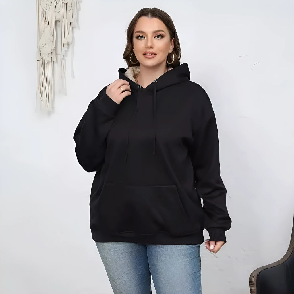 Women's loose fit grey hooded sweatshirt with a 3D textured pattern and a front pocket.