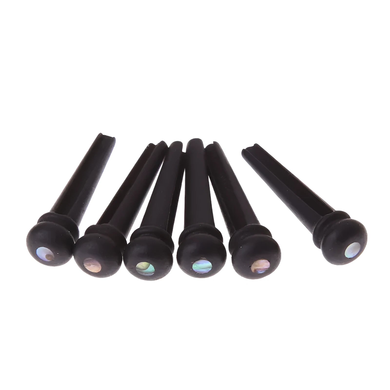 Six solid ebony guitar string nails with matte black finish for folk acoustic guitars