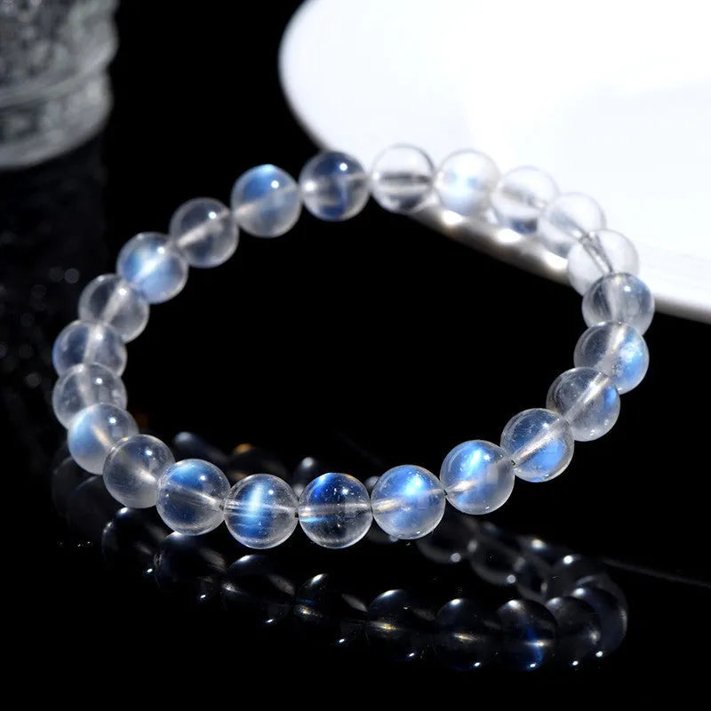 Natural Cream Body Blue Moonlight crystal bracelet with smooth ground beads.