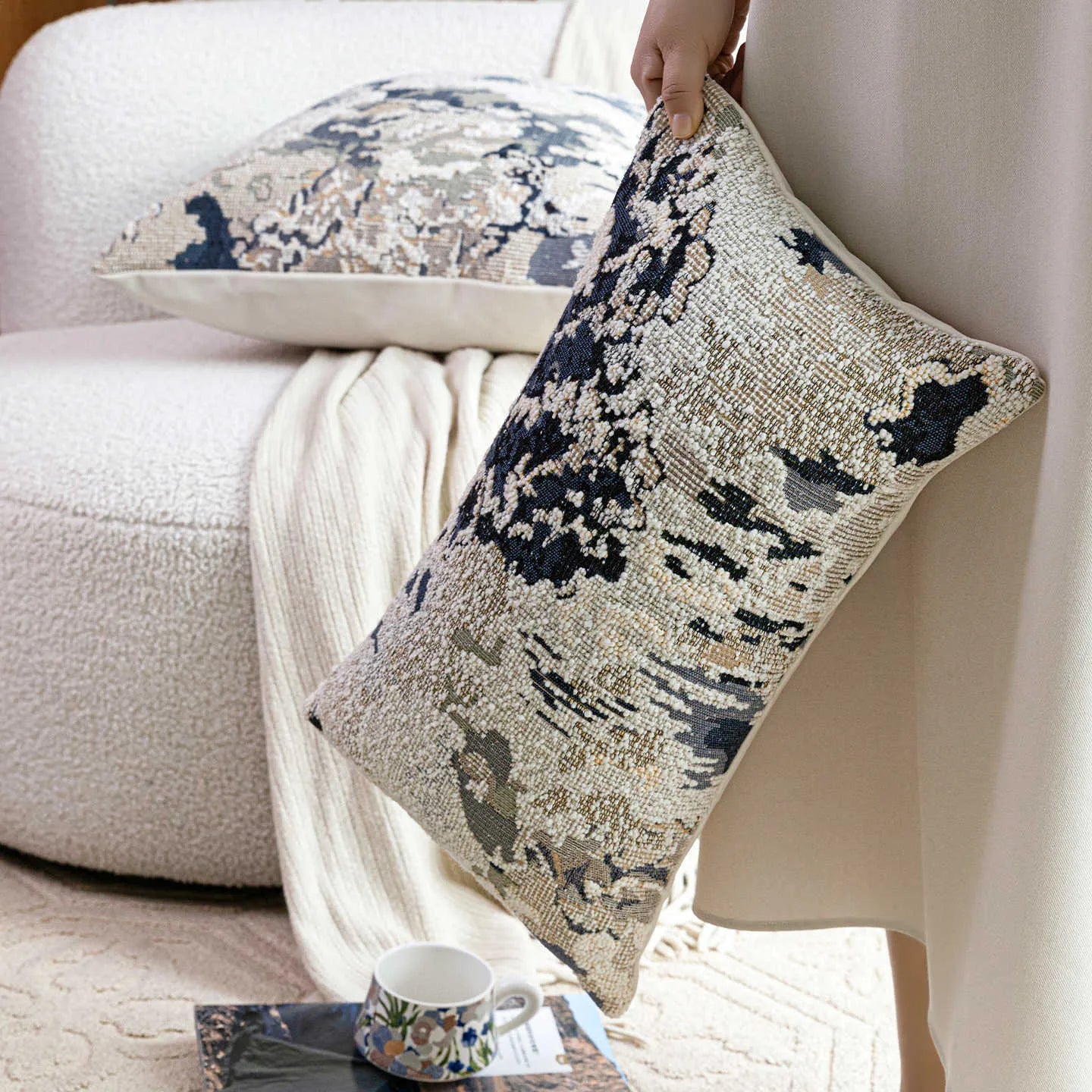 Blue wool blended decorative cushion with abstract flower pattern, shown in square and waist sizes.