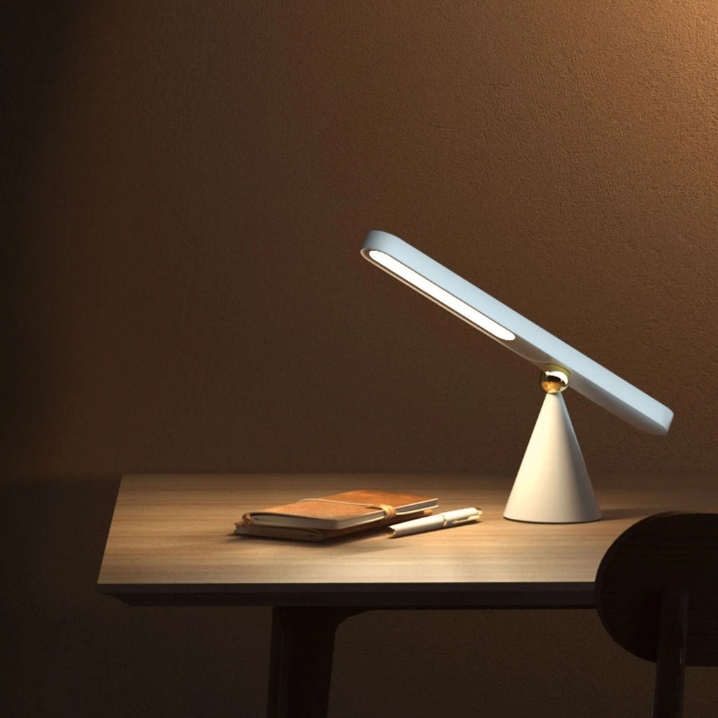 Geometric USB desk lamp with magnetic suction base for wall mounting in white colour