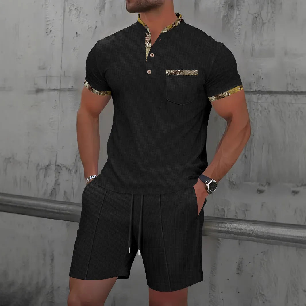 Men's grey waffle zipper polo collar short sleeve top with matching shorts laid flat