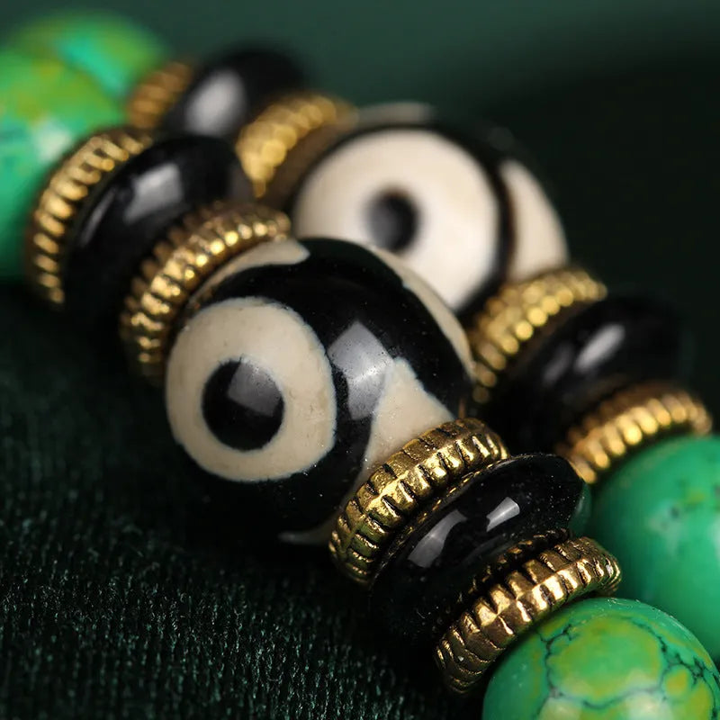 Natural turquoise bracelet with 108 round 8mm beads on wrist showing polished stone texture