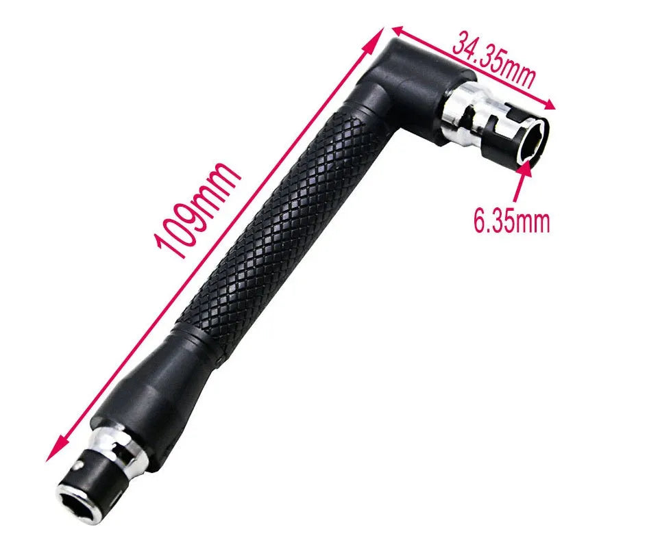 L-shaped double-headed socket wrench set with drill bits and sockets on a workbench.