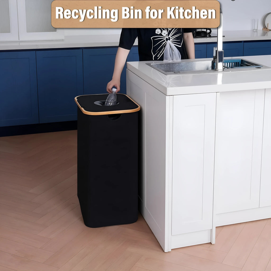 Black bamboo laundry basket with removable lid, ventilation holes, and two inner pockets.