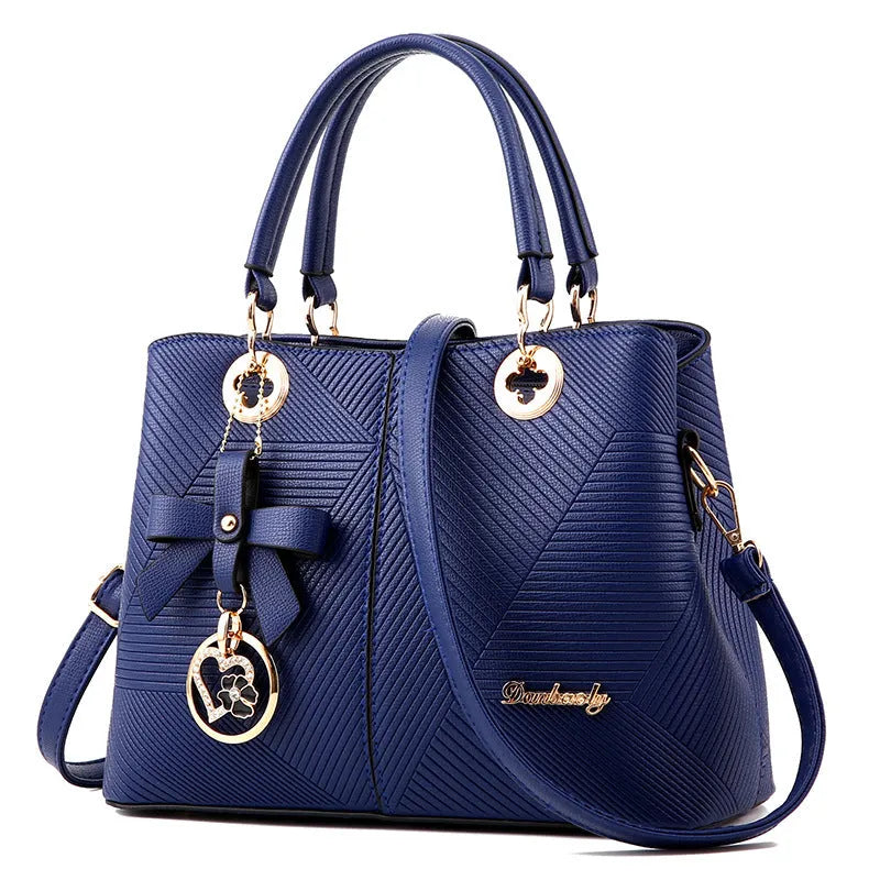 Retro fashion handbag in PU leather with a zipper and one-shoulder strap.