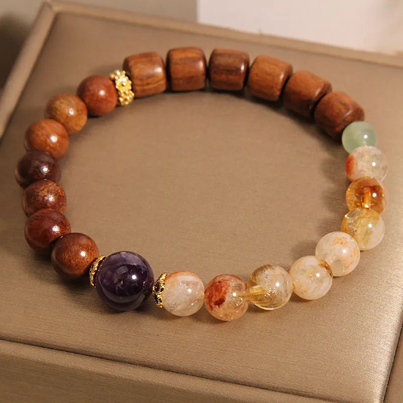 Pineapple yellow women's crystal bracelet with yellow tower crystal, ebony amethyst beads, pearl, rhinestone and sequin decorative elements