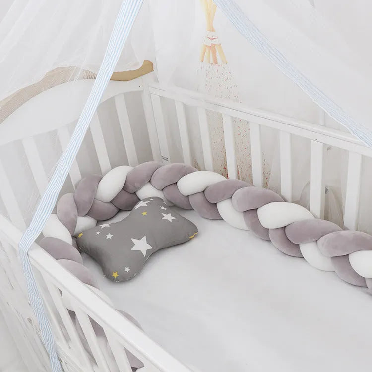 Baby crib bumper in crystal velvet with braid knot design showing flexible length options for cot protection