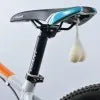 Heart-shaped silicone bike rear light, 15 cm long, touch activated, waterproof, in red blue green.