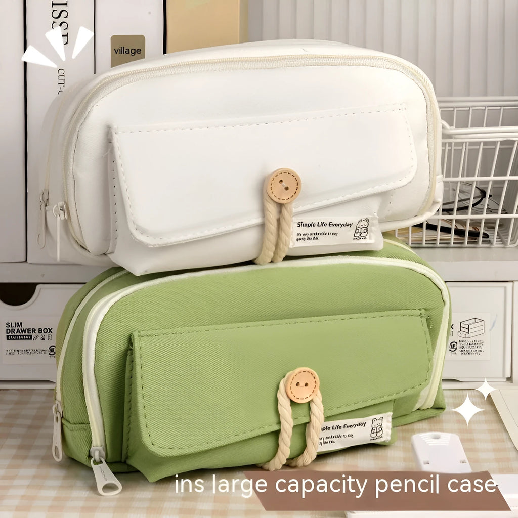 Korean style canvas pencil case in green, beige, blue, or grey, showing large capacity for pens.