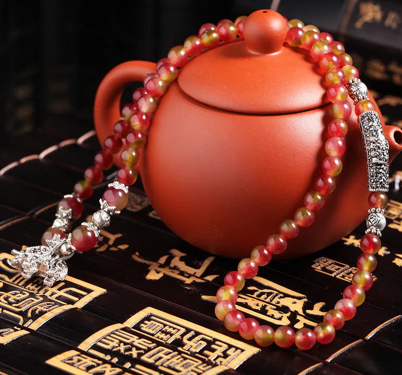 Handmade natural watermelon crystal bracelet with Chinese knot design and geometric beads