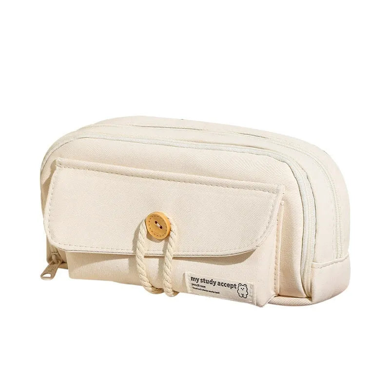 Korean style canvas pencil case in green, beige, blue, or grey, showing large capacity for pens.