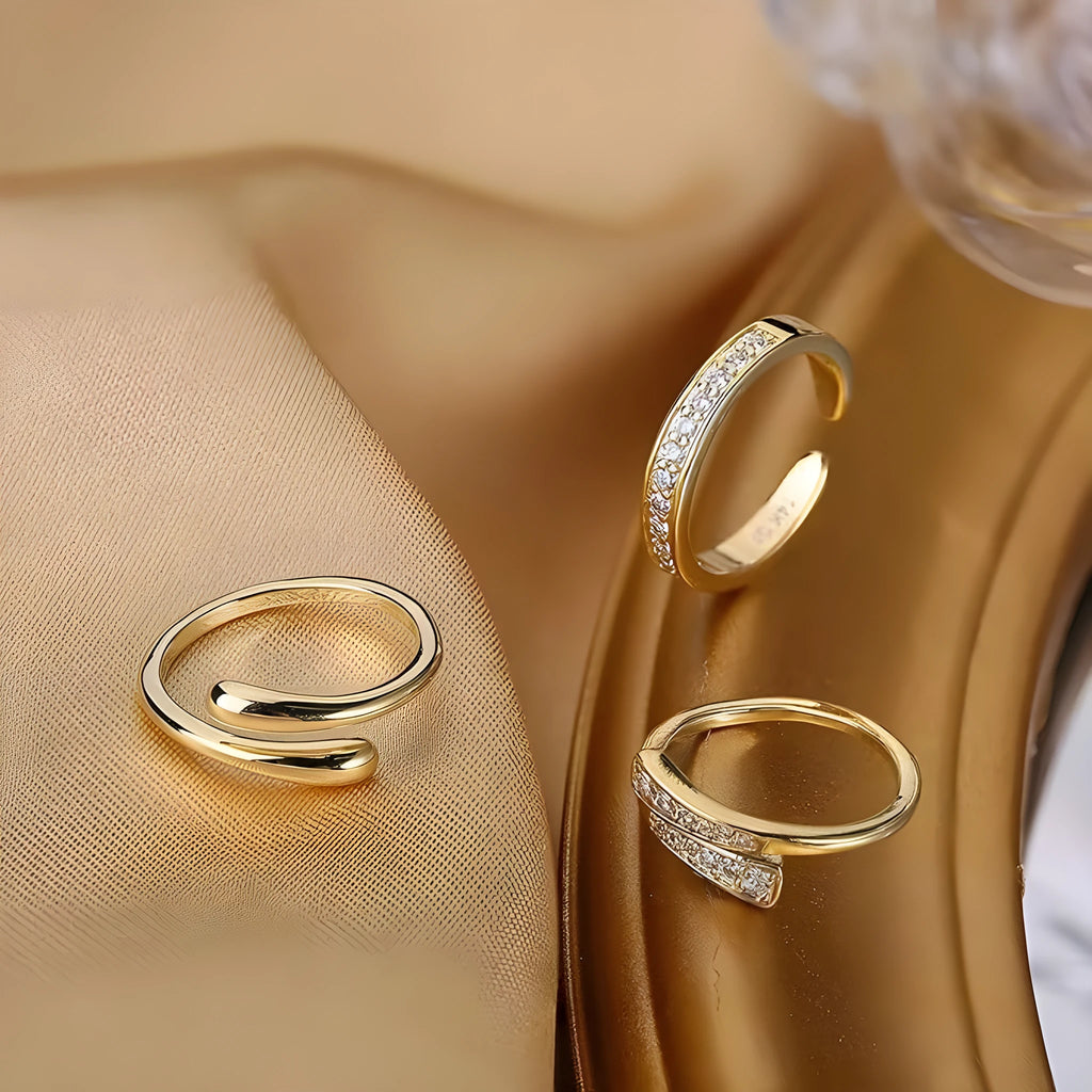 Geometric toe ring with copper plating and 14K gold finish, showing rhinestone decoration