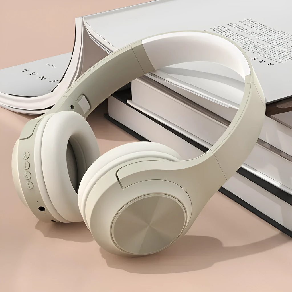 Wireless Bluetooth headset with charging bin in Ivory White colour