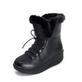 Women's black platform winter boots with lace-up closure and plush lining