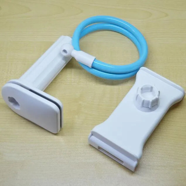 Black aluminium alloy bedside phone stand with a long flexible arm holding a mobile phone on a table.