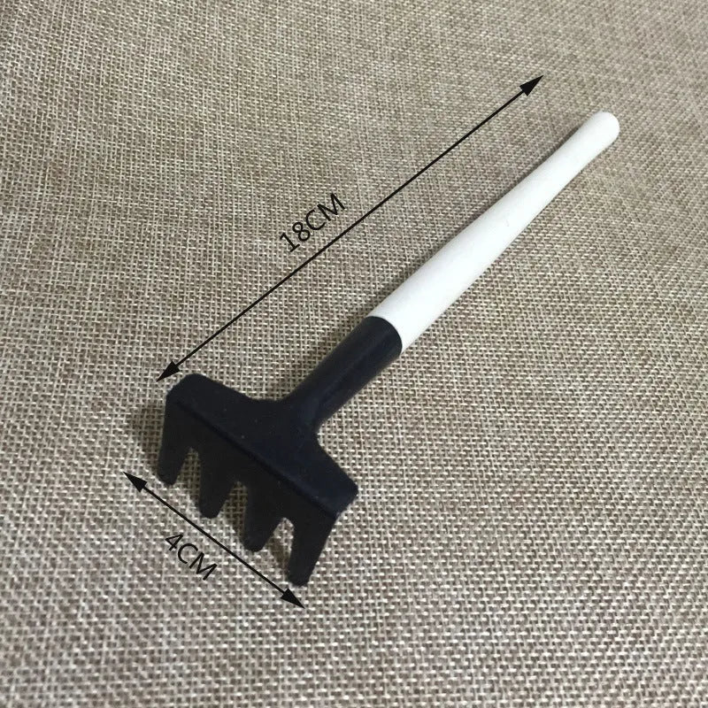Succulent gardening tool set with watering can, tweezers, mini shovel, and rake for cactus care.