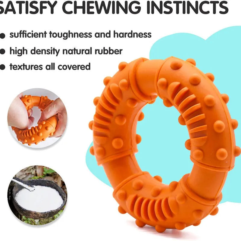 Blue hollow dog fetching stick toy on grass, showing its chewable texture and size.