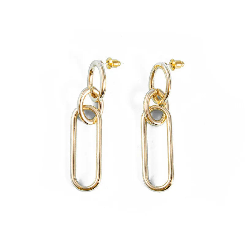 Geometric sterling silver needle colour hoop drop earrings with ring and line design on a white background.