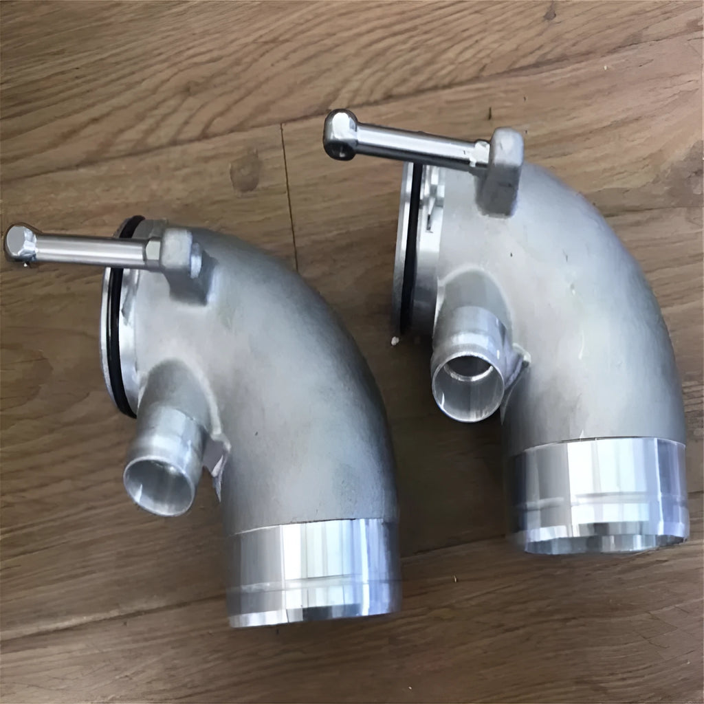 Aluminium alloy 90-degree turbine tube elbow connector for automotive lateral engine positioning