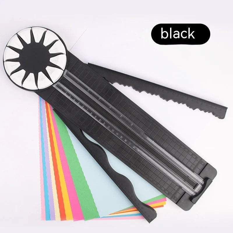 Pink and black plastic paper cutting machine with dotted grid pattern and multiple cutting functions
