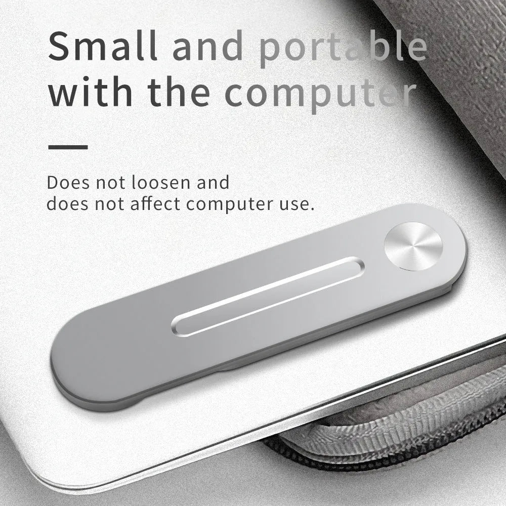 Silver aluminium laptop bracket holding a smartphone next to a laptop screen.