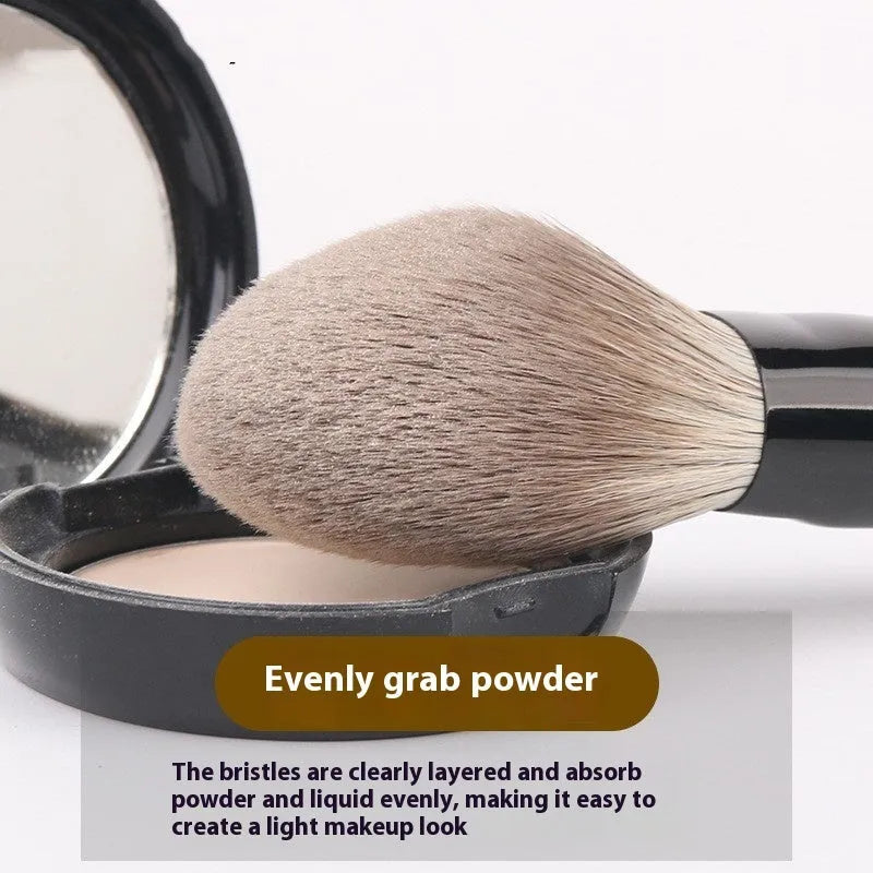12-piece makeup brush set with wooden handles and a grey PU case