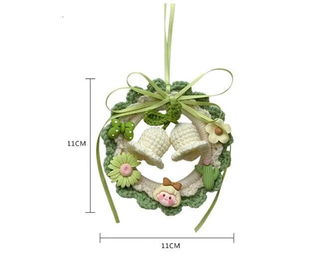 Woven wool bell orchid car pendant hanging from rear-view mirror with green colour finish