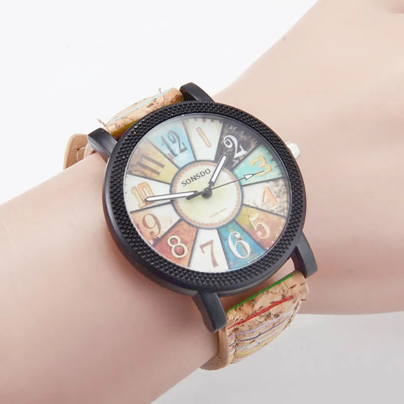 Women's vintage leather strap quartz watch with 37mm round dial and stainless steel buckle