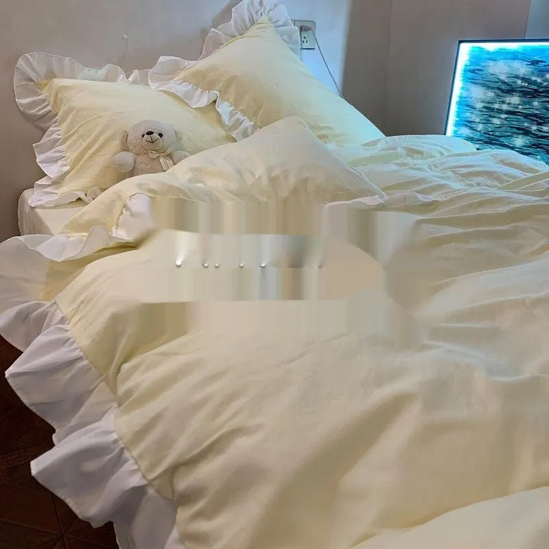Mori style solid colour washed cotton bedding four-piece set with quilt cover on a bed.