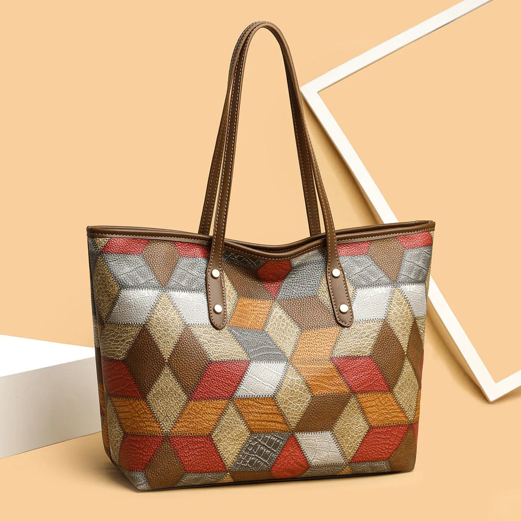 Women's large capacity PVC shoulder handbag in blue brown colour with sandwich pocket design