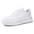 Women's white leather lace-up casual flat shoes on a plain background
